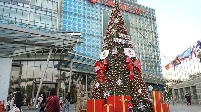 Giant Christmas trees bring festive cheer to streets of Hanoi
